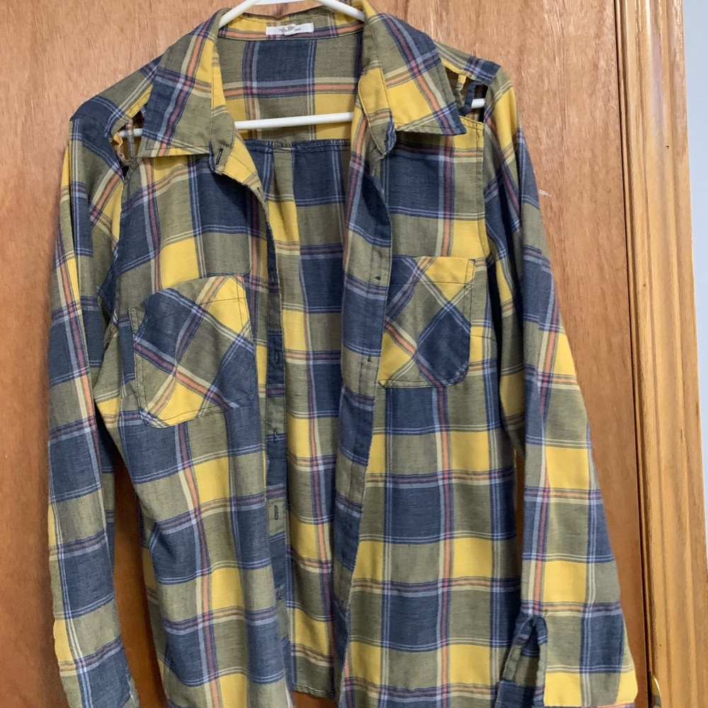 Woman’s yellow and blue plaid shirt